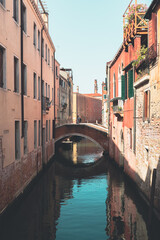 Fototapeta na wymiar Small bridge over canal in Venice