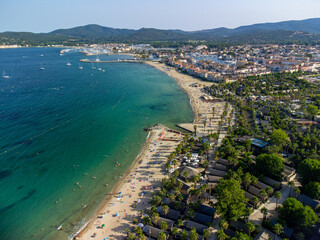 Fototapeta premium Aerial view on Gulf of Saint-Tropez, sail boats, houses of Port Grimaud and Port Cogolin, summer vacation in Provence, France