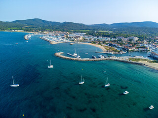 Aerial view on Gulf of Saint-Tropez, sail boats, houses of Port Grimaud and Port Cogolin, summer...