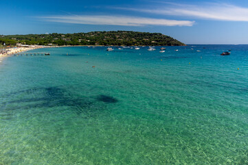 Aerial view of legendary Pampelonne beach near Saint-Tropez, summer vacation on white sandy beaches of French Riviera, France