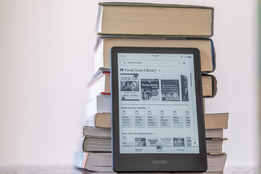 15 July 2022 - Calgary, Alberta Canada - Amazon kindle tablet for reading books.