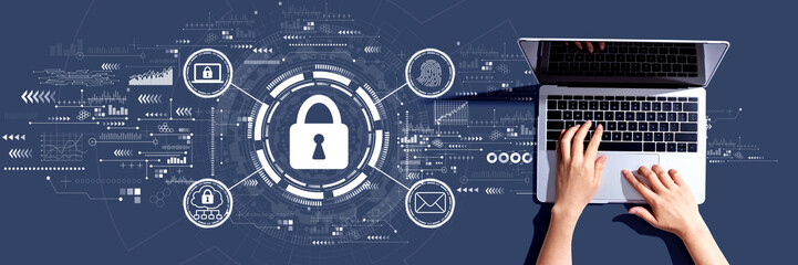 Internet network security concept with person using a laptop
