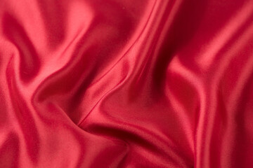 Fototapeta na wymiar abstract luxury red silk fabric cloth or liquid wave or texture satin background
