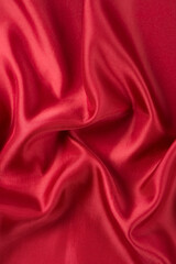 abstract luxury red silk fabric cloth or liquid wave or texture satin background