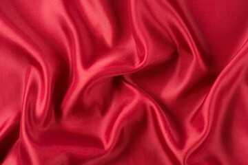 abstract luxury red silk fabric cloth or liquid wave or texture satin background