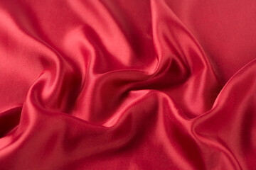 abstract luxury red silk fabric cloth or liquid wave or texture satin background