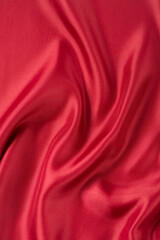 Obraz premium abstract luxury red silk fabric cloth or liquid wave or texture satin background