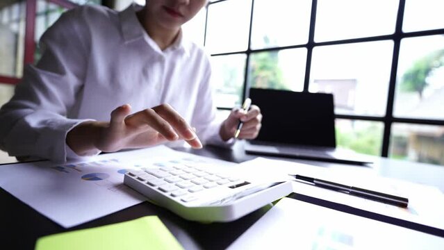 Investor analyzing finance estimation charts, financial analytics, business man working on investment plan in office