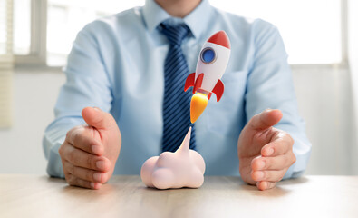 Rocket in businessman's hands, idea, success, development, Startup business project concept.
