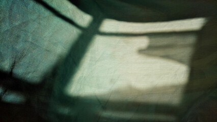 shadow of a Window on a piece of cloth. Light and shade.