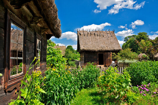 Museum of Agriculture in Ciechanowiec, Podlaskie voivodeship, Poland. Wooden cottages, garden, mill, church and other devices used to use by Pollish farmers.