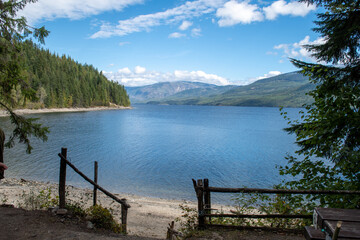 Fototapeta na wymiar Adams lake shore, British Columbia, beautiful sunny day, forest of cedars