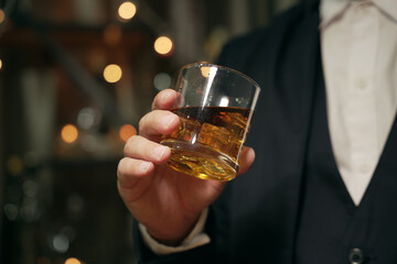 Barman pouring whiskey whiskey glass beautiful night