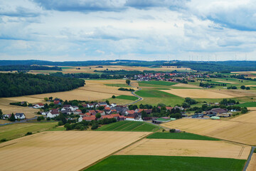 Naklejka premium Landscape in Germany in summer from above. Top view. Nature, forests, fields.
