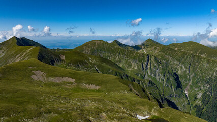 aerial view on green mountain peaks 