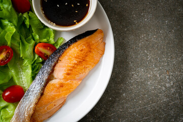 grilled salmon fillet steak with salad