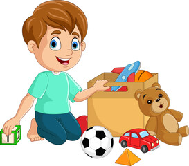 Happy little boy playing with toys