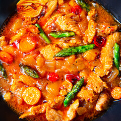 colorful turkey fricassee with asparagus and paprika