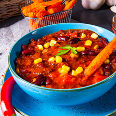 chili con carne with sweet potato and spicy nachos