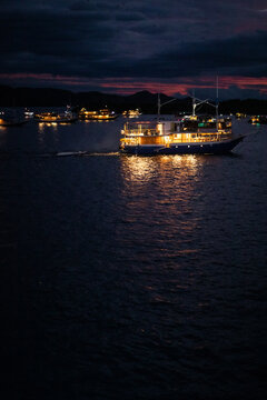 kalong island, is an island within Komodo archipelago.  
Thousand of bat flying out of their home looking for food. This photo was taken during my holiday