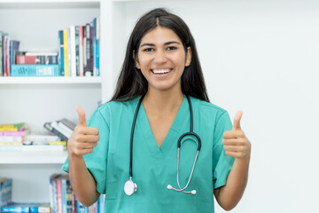 Optimistic laughing south american female nurse or doctor
