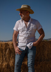 Adult man in cowboy hat in fields. Castilla y Leon, Spain
