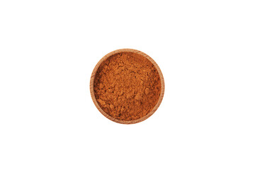 Aguaje powder in wooden bowl on white background, top view. Dried and pulverized pulp of aguaje provides great nutritional value and medicinal benefits