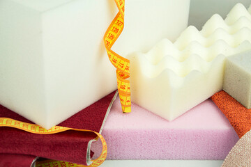 a piece of foam rubber of different sizes and colors, production of upholstered furniture.