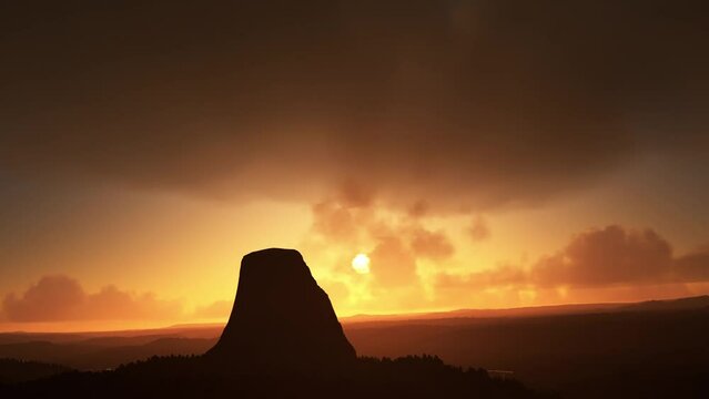 Close-up aerial view of Devils Tower at sunset in Wyoming. United States of America