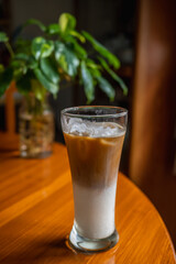 
Iced latte on wooden table
