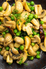 Mushroom and Pea Curry with Roasted Garlic, Indian food served in a bowl