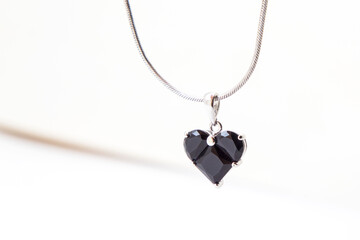 Heart-shaped pendant on a white background