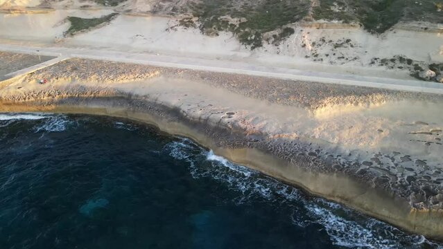 A drone view of salt pans - island of Gozo. Its heavenly beautiful place in Malta