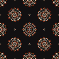 Vector ethnic tribal red-gold color flower circle shape seamless pattern on black background. Use for fabric, textile, interior decoration elements, upholstery, wrapping.