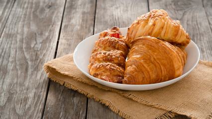 croissant in a white disk