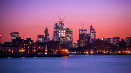 Panorama view of illuminated London cityscape at night, financial district