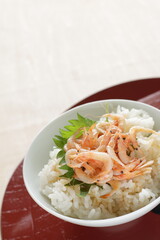 Japanese food, boiled shrimps and herbal Shiso on rice 