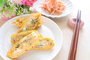 Japanese boiled shrimps and herbal Shiso in fried egg roll
