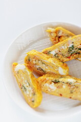 Japanese boiled shrimps and herbal Shiso in fried egg roll
