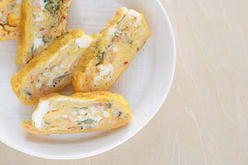 Japanese boiled shrimps and herbal Shiso in fried egg roll