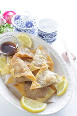 Chinese food, deep fried wonton for homemade comfort dumpling food served with tea