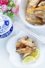 Chinese food, grilled chicken wings and tea