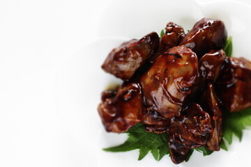 Chinese food, braised chicken livers on white dish for comfort food image