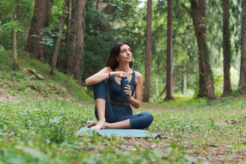 Woman relaxing in the forest