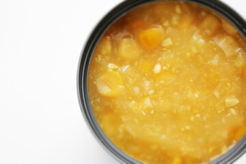 Canned food ingredient, sweetcorn cream in can with copy space shot from overhead 