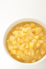 Sweetcorn paste in white bowl for cooking image 