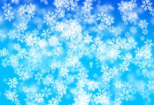 Digitally created image of Abstract blue snowflakes background.