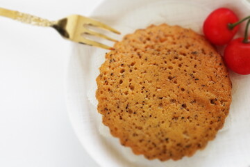 Homemade brown sugar cake served with cherry for gourmet dessert