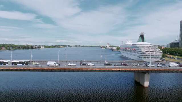 Beautiful cruise ship docked in Riga, Latvia near the old town and the bridge. Cruise in Latvia.