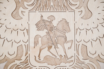 Coat of arms of Russia carved from wood